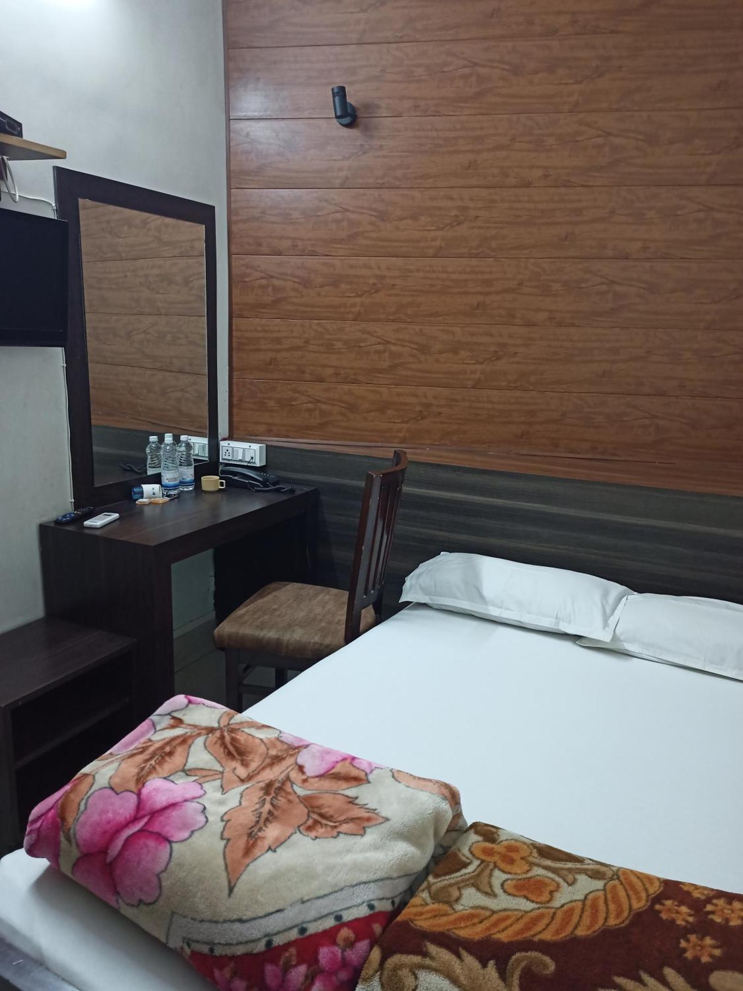 Standard Double Room with Shared Bathroom (Includes Ganga Aarti and Darshan assistance to Kashi Vishwanath Temple)