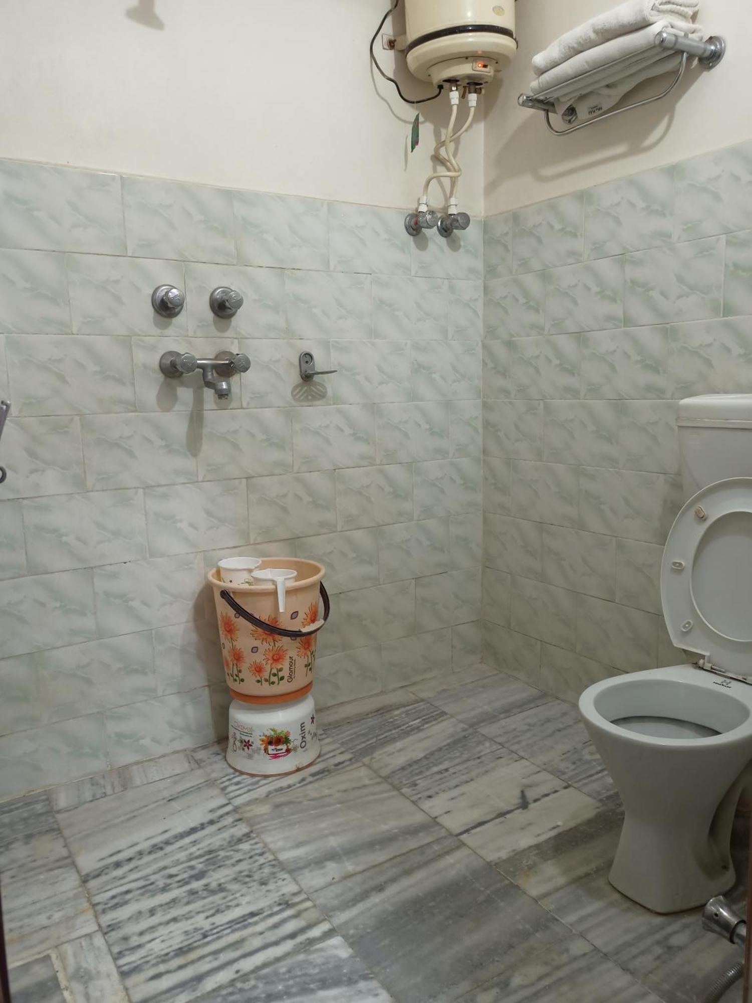 Standard Double Room (Includes Ganga Aarti and Darshan assistance to Kashi Vishwanath Temple)